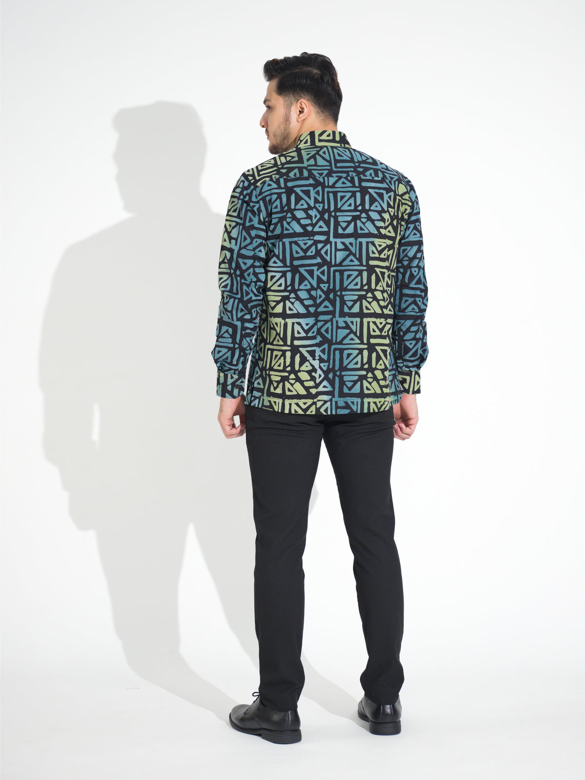 Gema GL901 long-sleeve batik shirt, black with teal and green geometric motif, back view