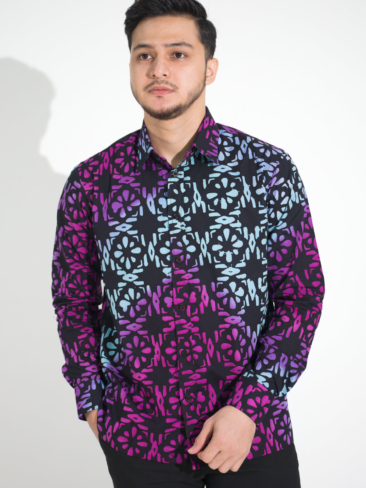 Gema GL904 long-sleeve batik shirt, black with magenta and blue floral tile motif, close-up