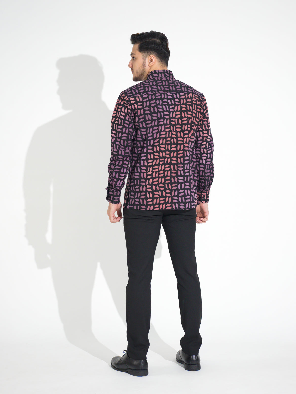 Gema GL906 long-sleeve batik shirt, black with coral and lilac petal motif, back view