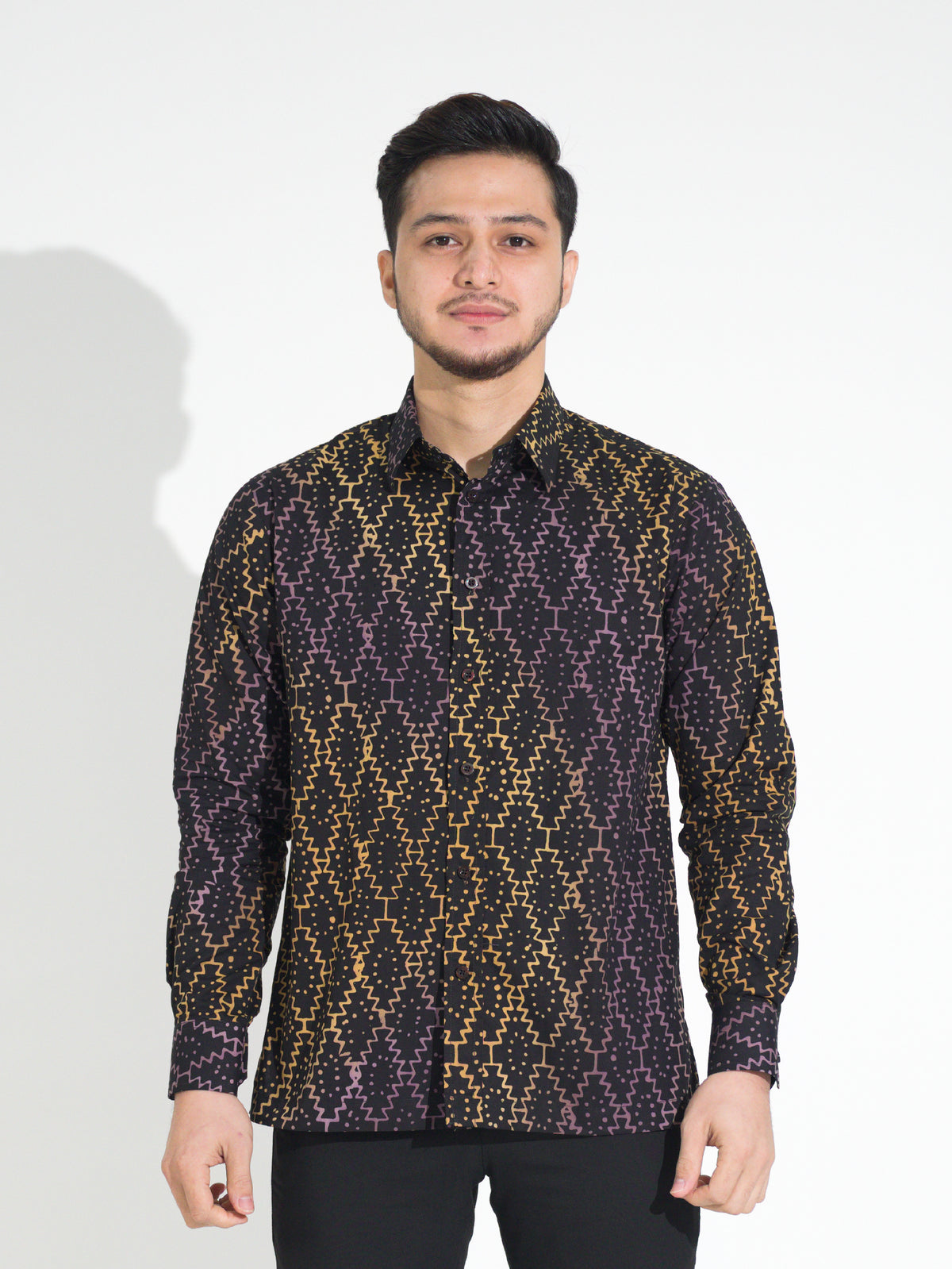 Gema GL907 long-sleeve batik shirt, black with gold and purple dotted diamond motif, front view