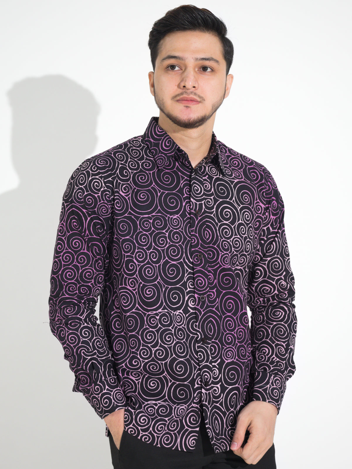 Gema GL908 long-sleeve batik shirt, black with purple spiral motif, close-up