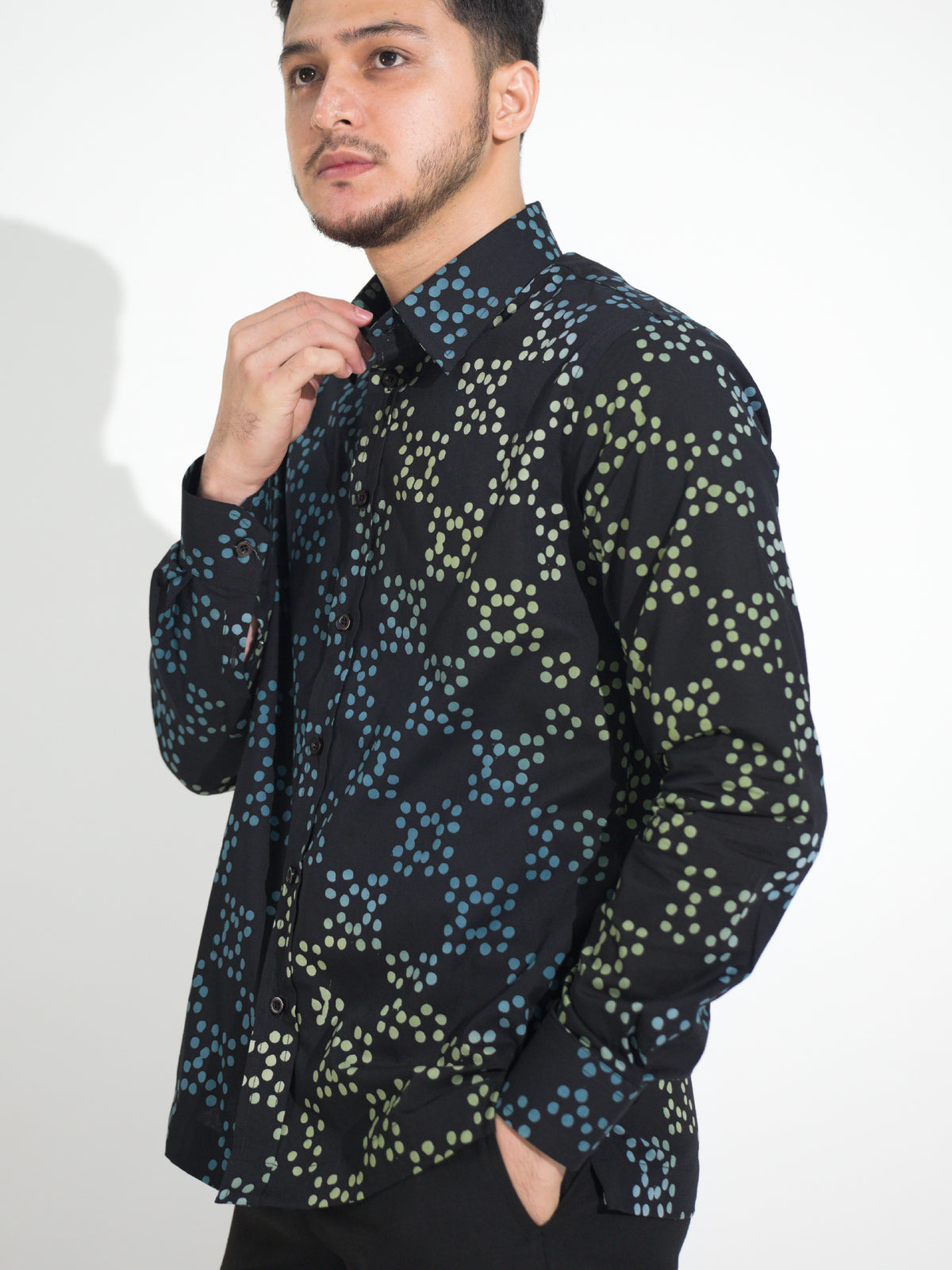 Gema GL909 long-sleeve batik shirt, black with blue and green checkered square motif, close-up