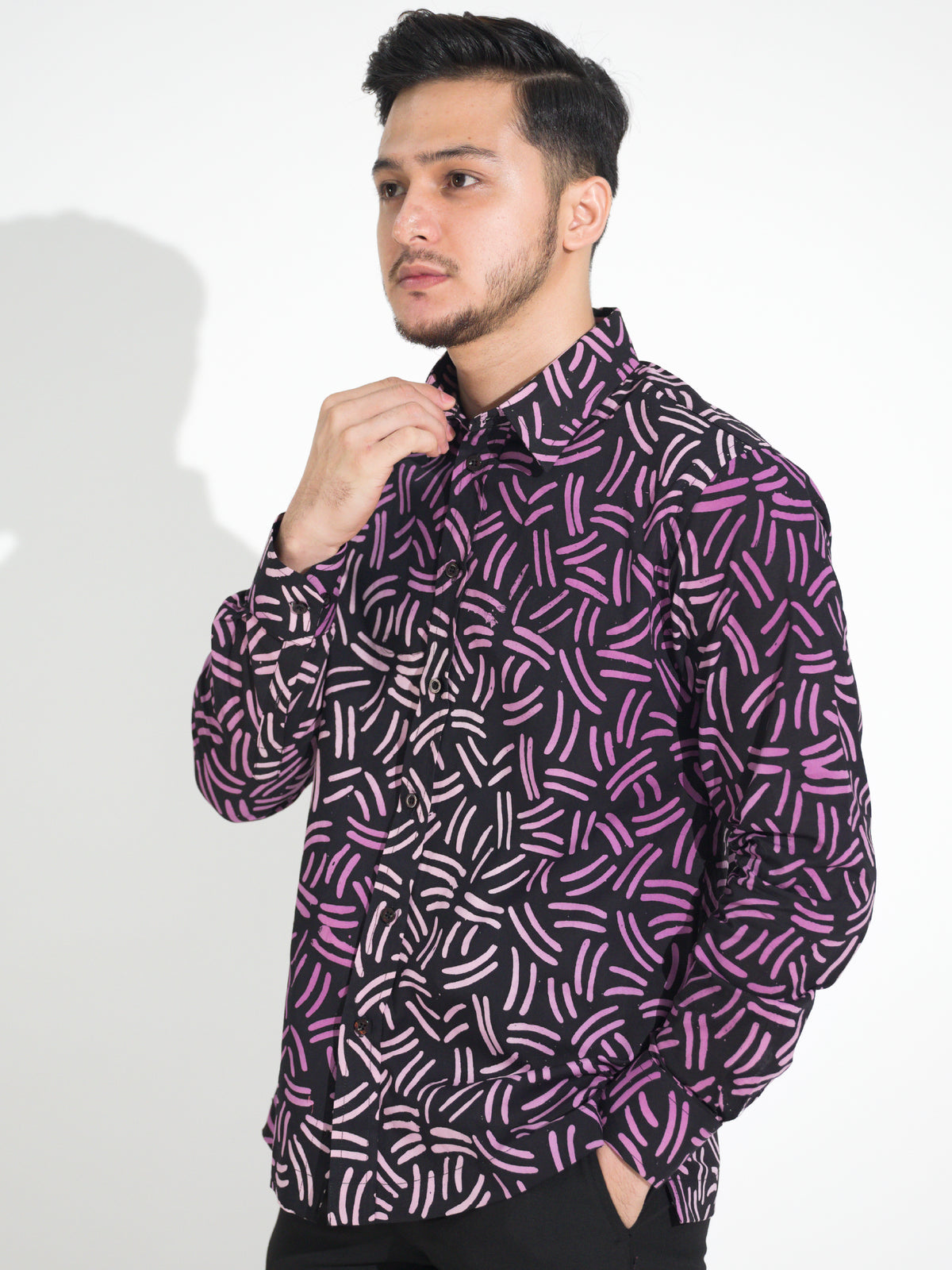 Gema GL910 long-sleeve batik shirt, black with pink and lilac brushstroke motif, close-up