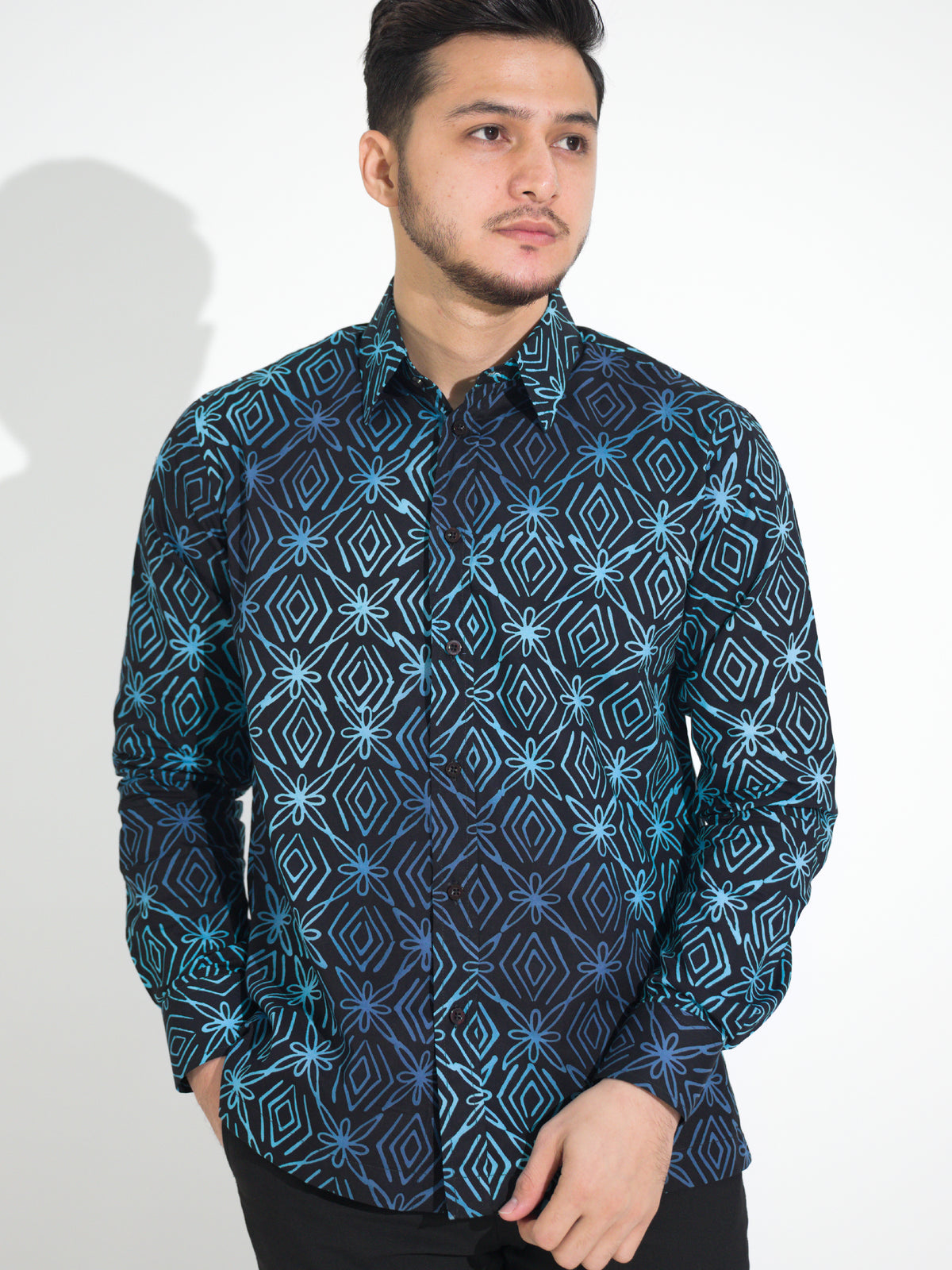 Gema GL914 long-sleeve batik shirt, navy with cyan star motif, close-up