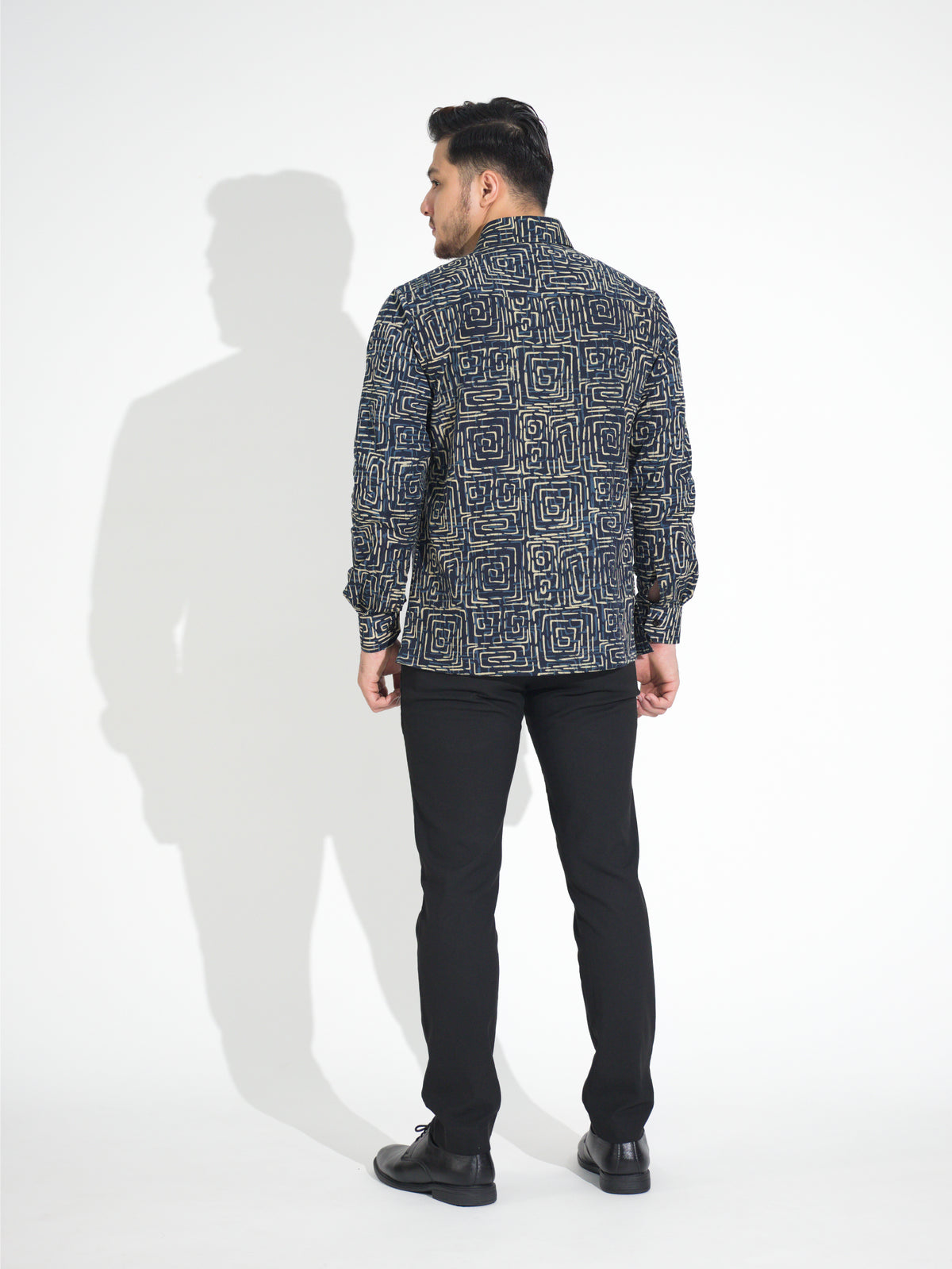 Ria RL901 long-sleeve batik shirt, navy with cream square spiral motif, back view