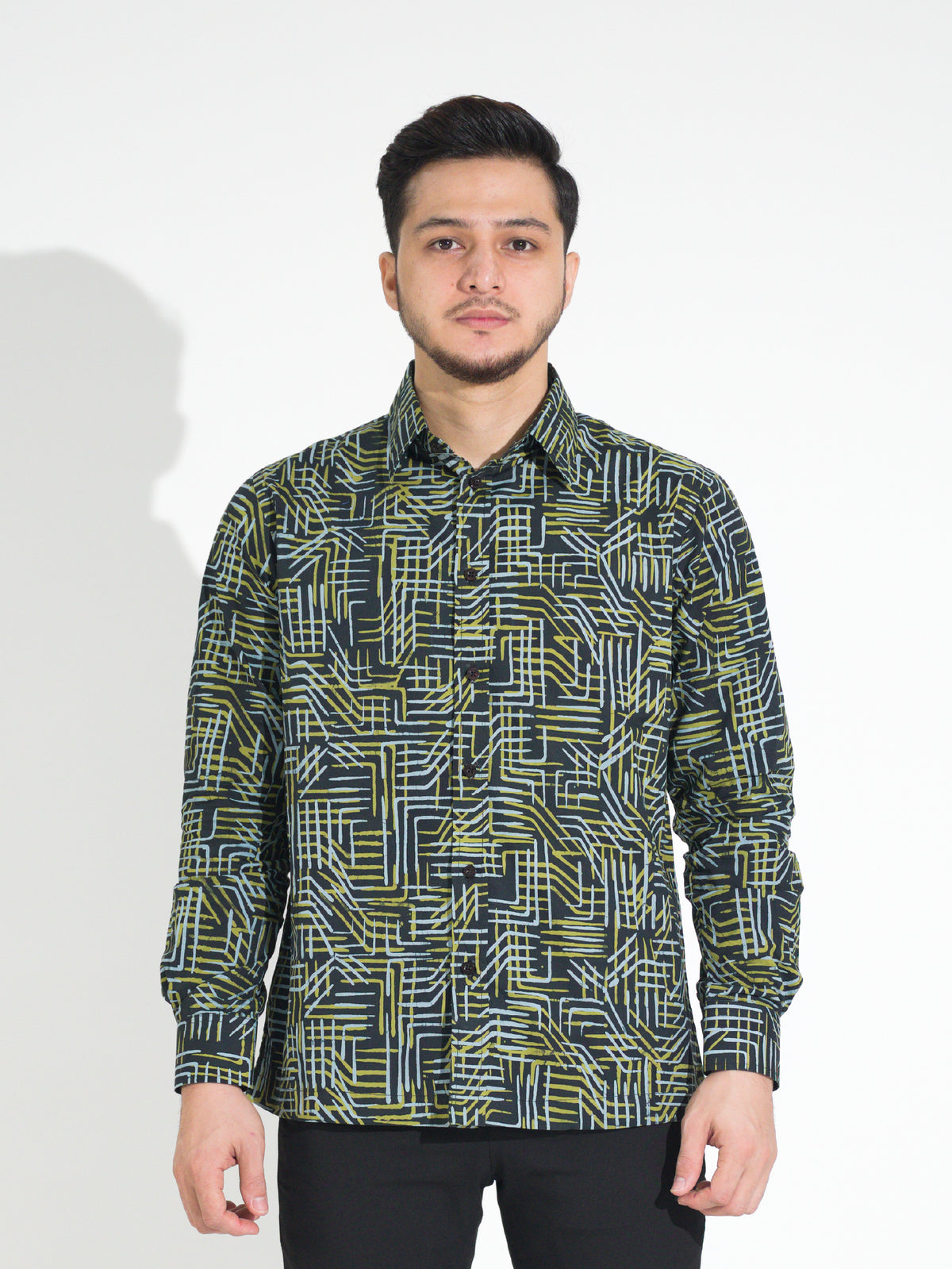 Ria RL903 long-sleeve batik shirt, black with green and white geometric line motif, front view