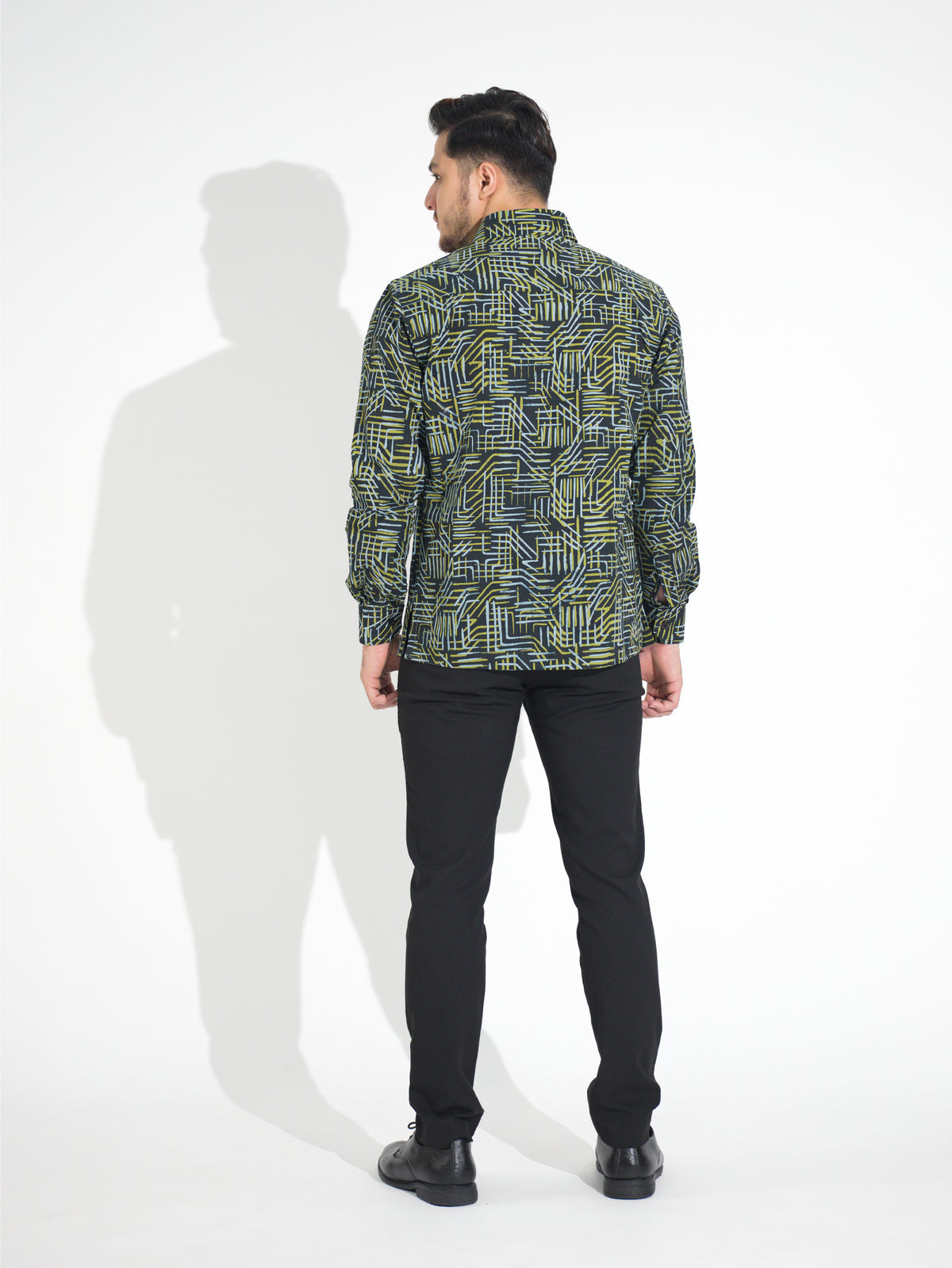 Ria RL903 long-sleeve batik shirt, black with green and white geometric line motif, back view