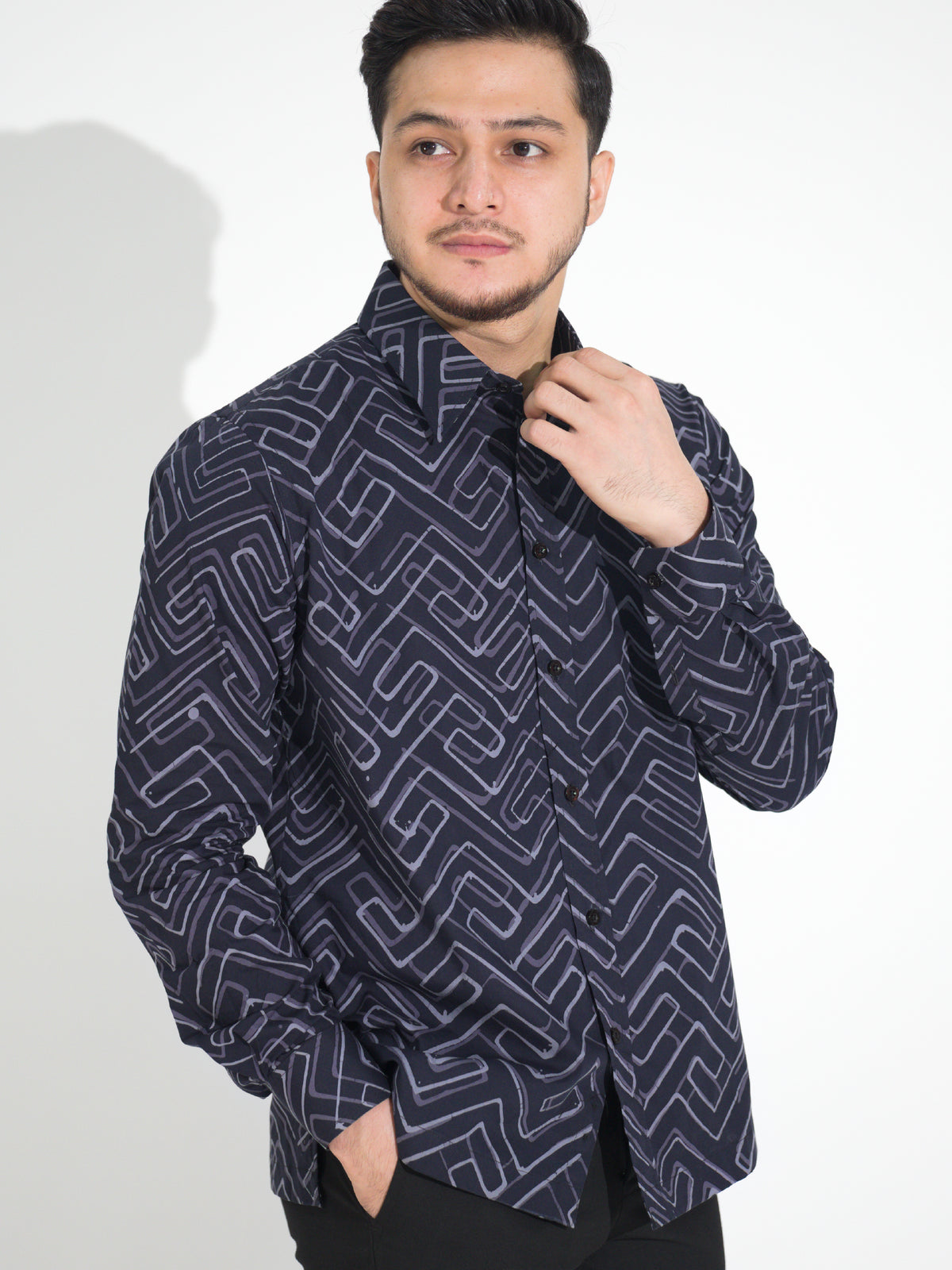 Ria RL904 long-sleeve batik shirt, navy with white zigzag motif, close-up