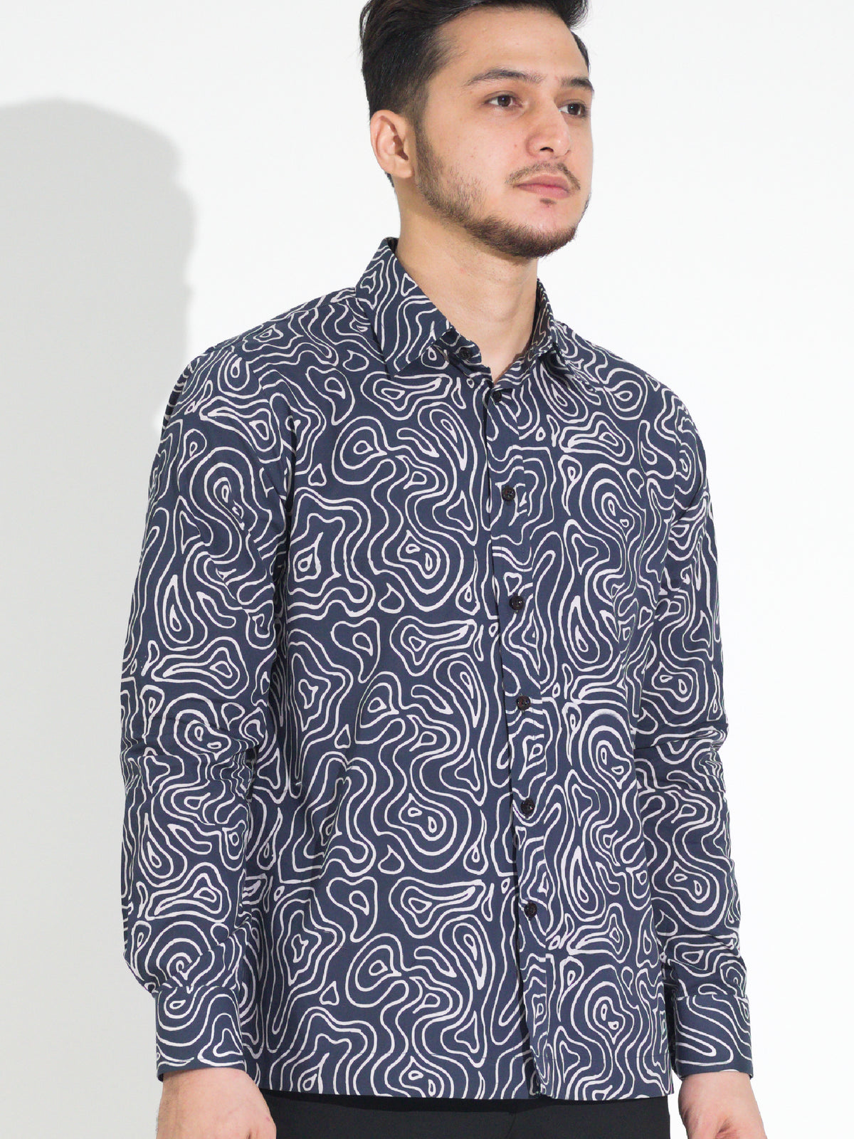 Tulus TL904 long-sleeve batik shirt, navy with white contour line motif, close-up