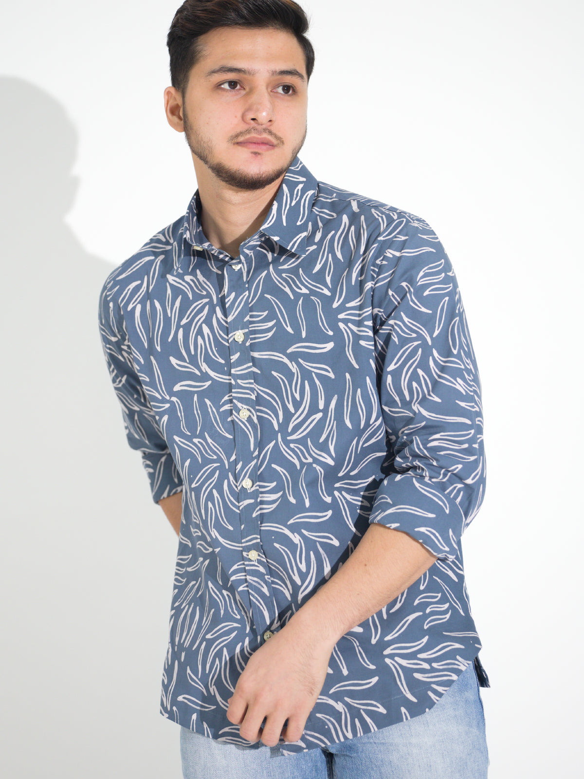 Tulus TL907 long-sleeve batik shirt, blue with white leaf motif, close-up